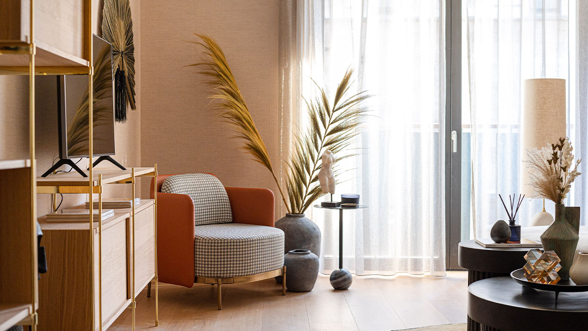 Modern living room with armchair and side table of Lincoln Square